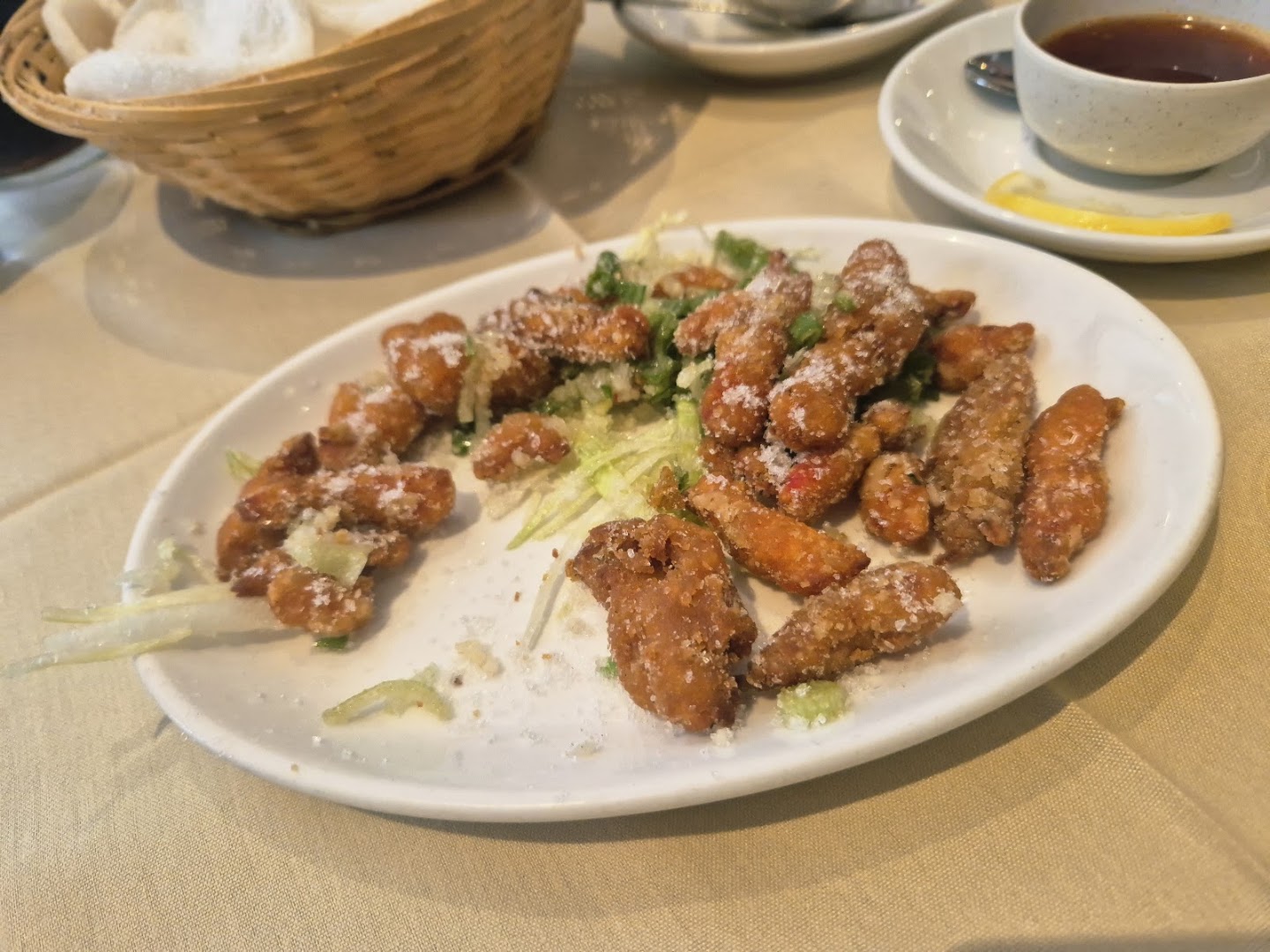 Crispy fried dish garnished with herbs