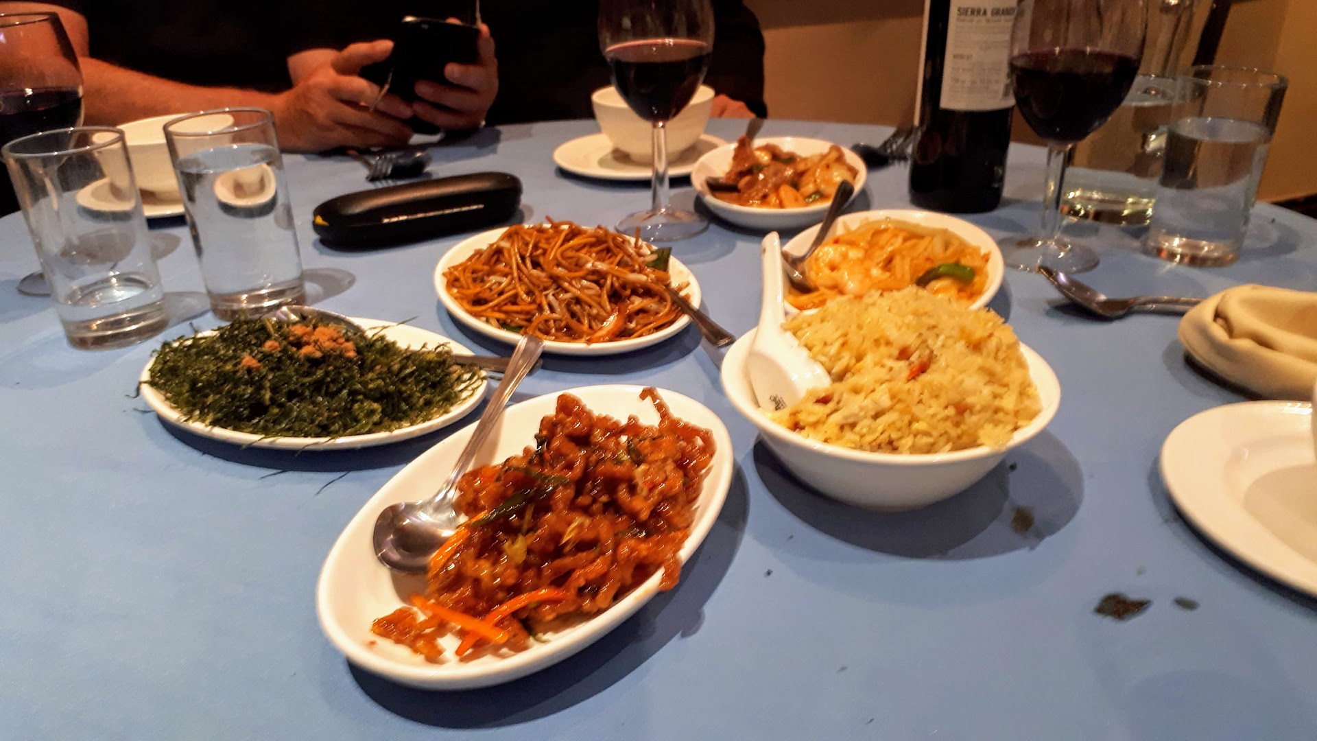 A table spread with Chinese dishes at Oriental Palace